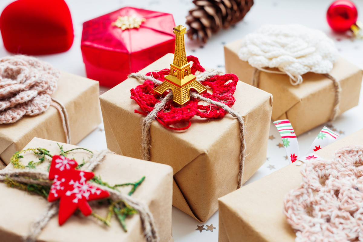 Gift boxes with festive decorations and ornaments.
